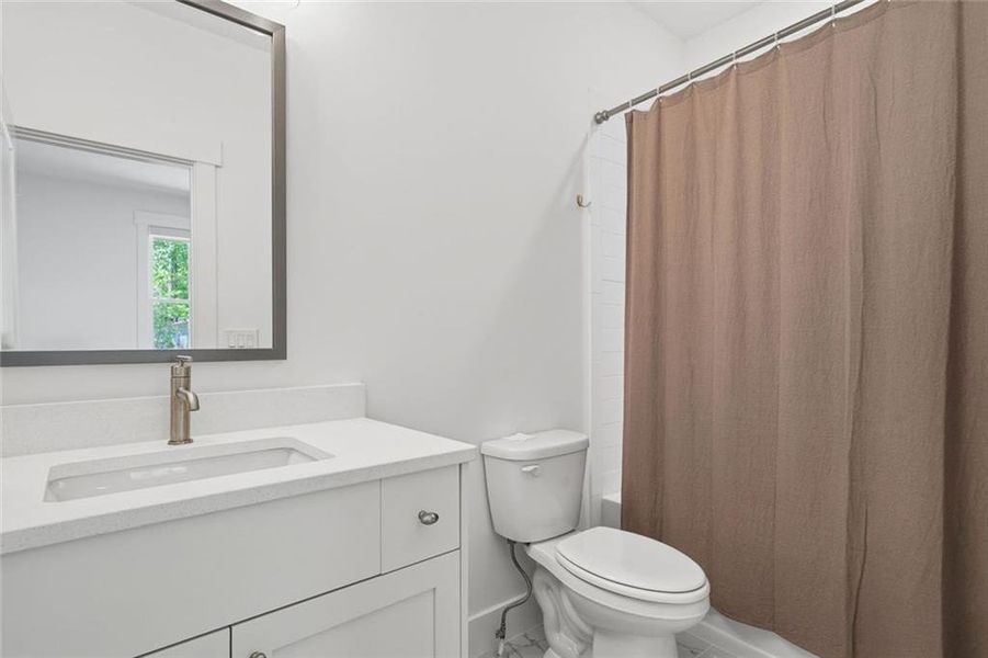 Furnished interior view inside a new home in Malone's Pond, Ball Ground (Image 42).