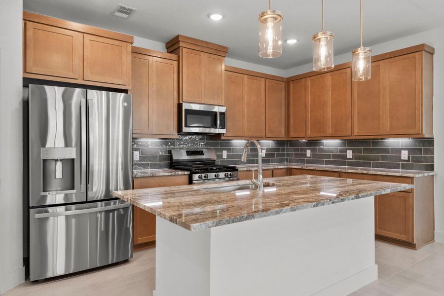 Furnished interior view inside a new home in Meridiana, Iowa Colony (Image 8).