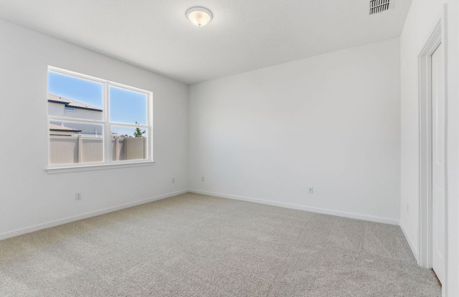 Spacious, unfurnished interior of a new home in Vida's Way, Wesley Chapel (Image 19).