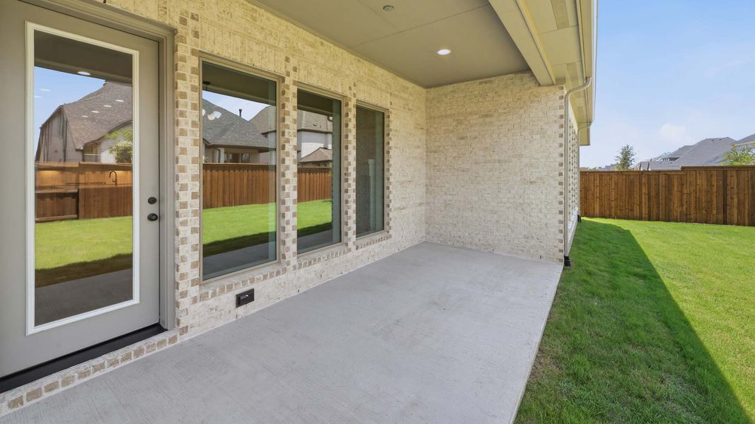 Exterior details and patio area of a home in Mosaic, Celina (Image 4). Exterior details and patio area of a home in Mosaic, Celina (Image 4).