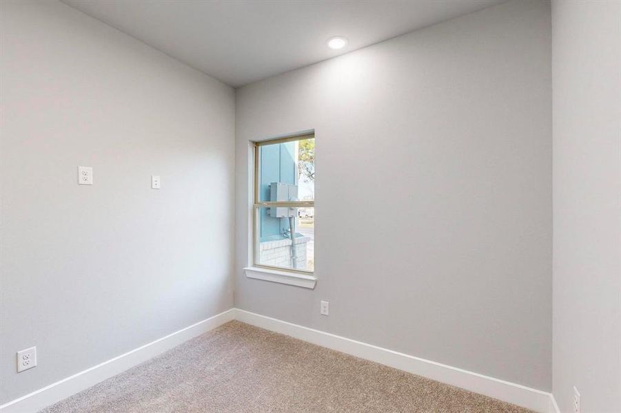 View of carpeted spare room