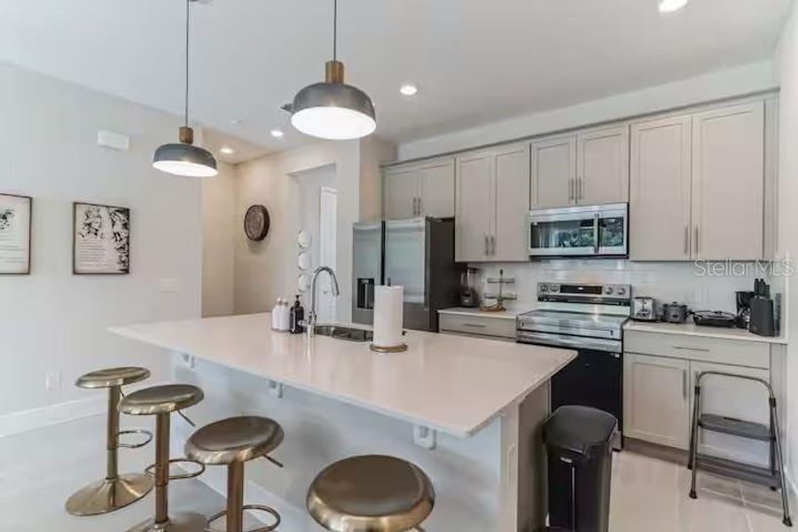 Furnished interior view inside a new home in , Reunion (Image 13).