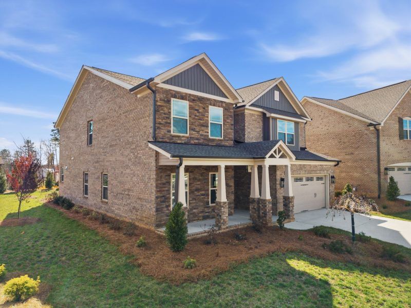 Front exterior of a new home in Blacksmith, Stokesdale, NC, highlighting curb appeal (Image 31).