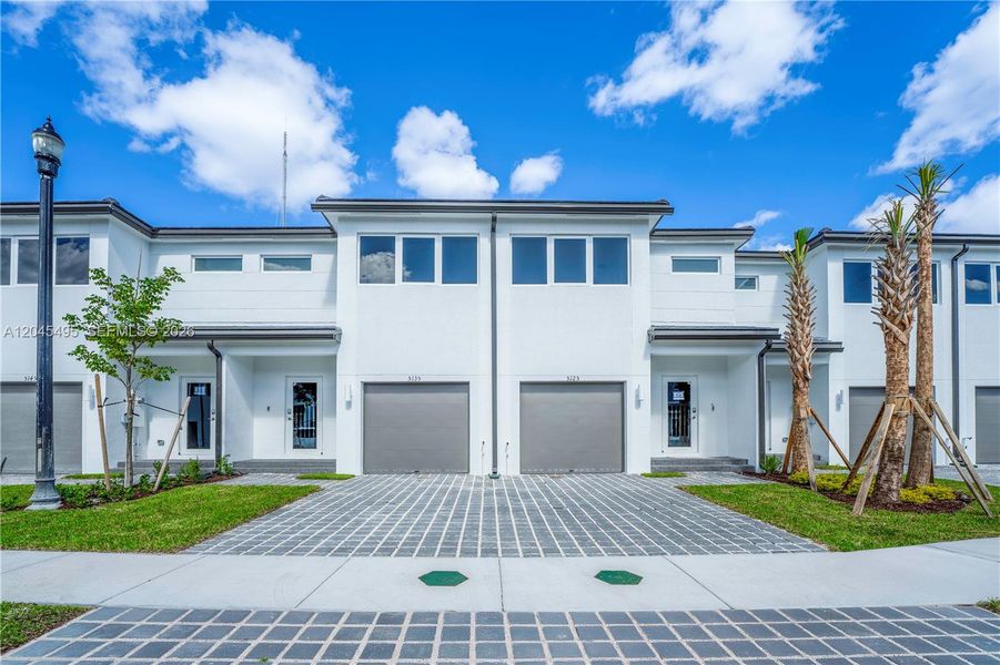 Front exterior of a new home in , Pembroke Park, FL, highlighting curb appeal (Image 2). Front exterior of a new home in , Pembroke Park, FL, highlighting curb appeal (Image 2).