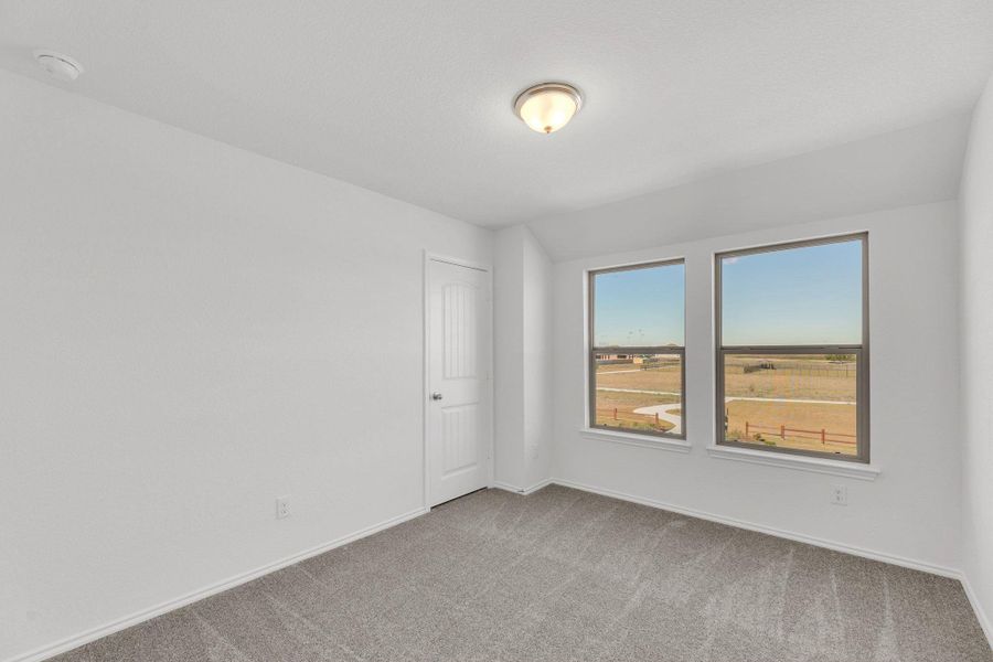 Spacious, unfurnished interior of a new home in Mustang Valley, Manor (Image 12). Spacious, unfurnished interior of a new home in Mustang Valley, Manor (Image 12).