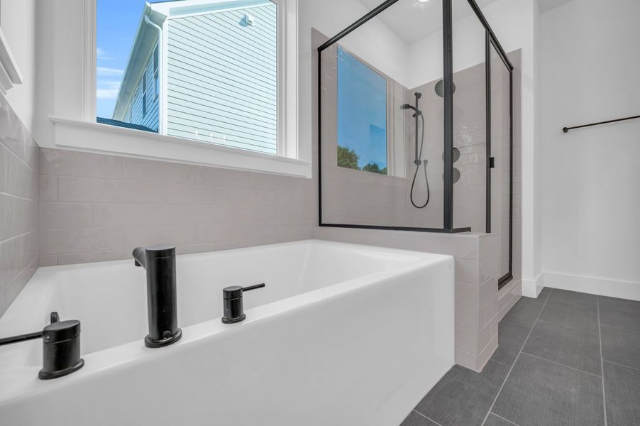 Representative furnished interior of a home built from the The Bradley by RobuckHomes in Windwater, Hampstead (Image 13).