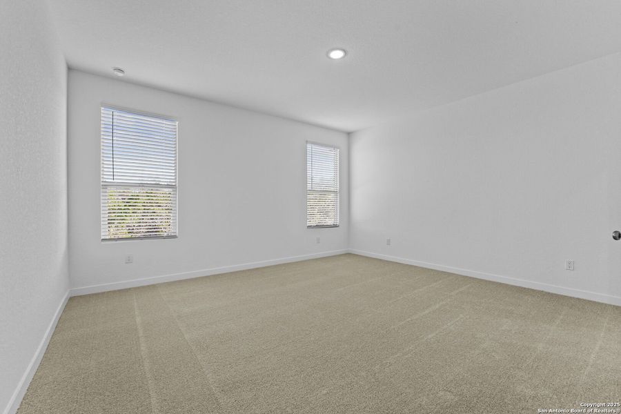 Spacious, unfurnished interior of a new home in Waterwheel: Coastline Collection, San Antonio (Image 20).