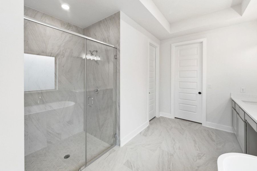 Furnished interior view inside a new home in The Colony, Bastrop (Image 11).