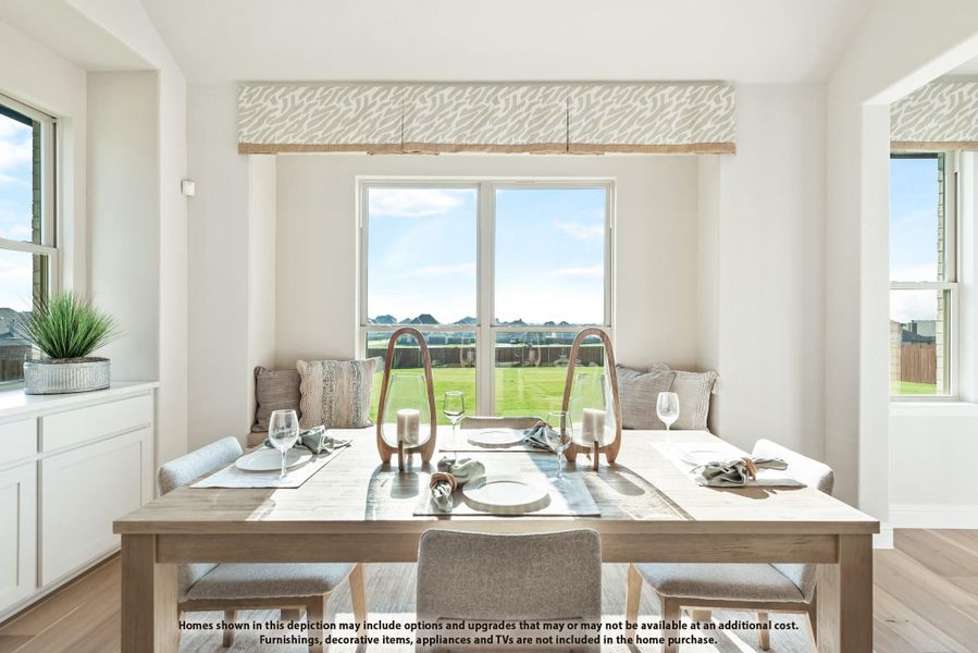 Bright dining area with wood table, upholstered chairs, bench seating, and large windows overlooking a backyard Bright dining area with wood table, upholstered chairs, bench seating, and large windows overlooking a backyard