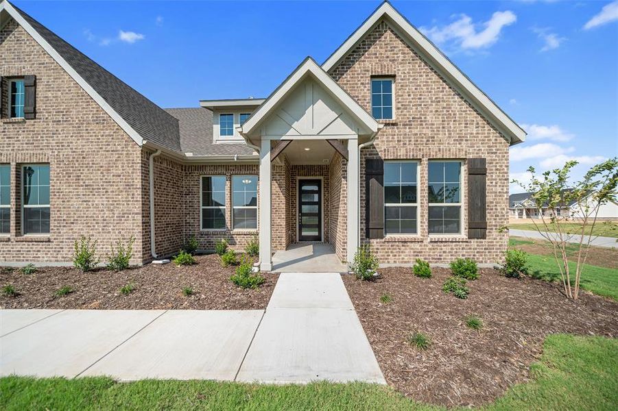Front exterior of a new home in Fairview Meadows, New Fairview, TX, highlighting curb appeal (Image 17).