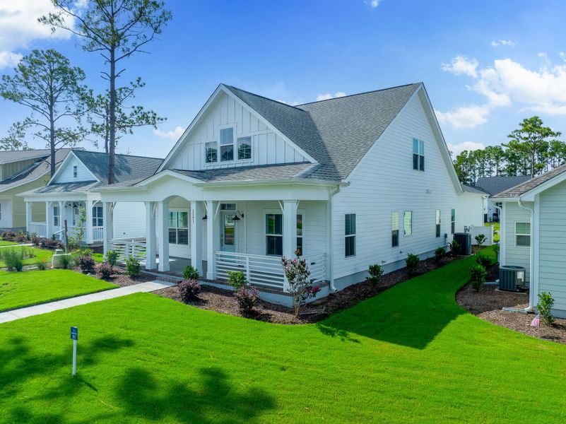Front exterior of a new home in Osprey Landing, Southport, NC, highlighting curb appeal (Image 25).