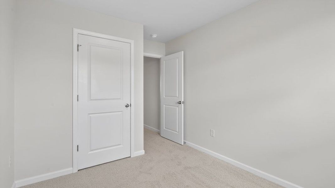 Spacious, unfurnished interior of a new home in The Townes at Honeycutt Oaks, Angier (Image 23).