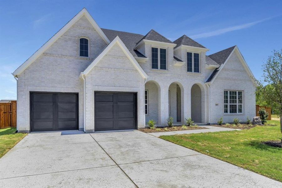 View of front of house with a front lawn