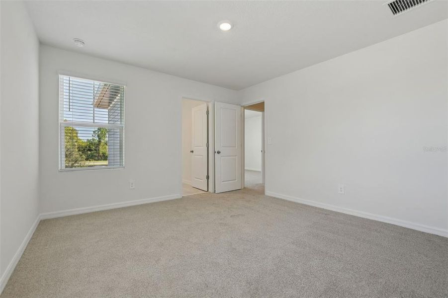 Spacious, unfurnished interior of a new home in Bradford Park, Ormond Beach (Image 21).