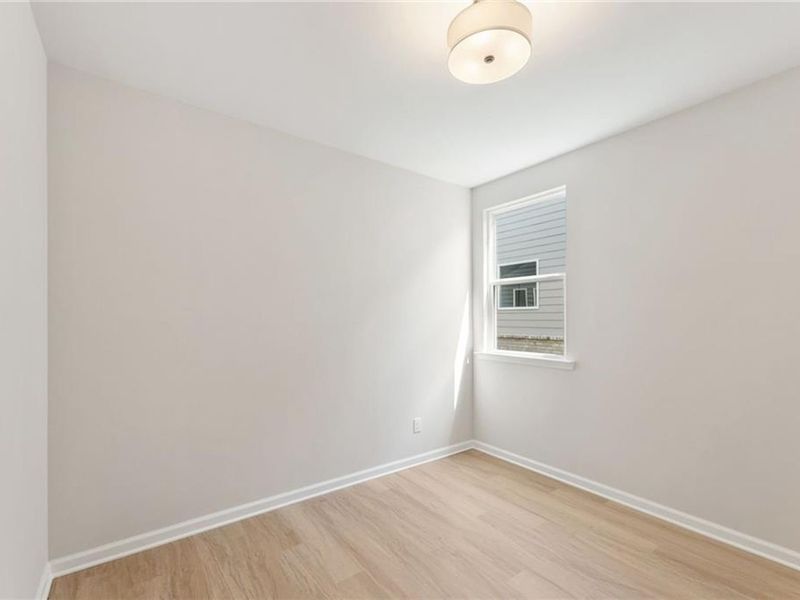 Spacious, unfurnished interior of a new home in Kelly Preserve, Loganville (Image 23).