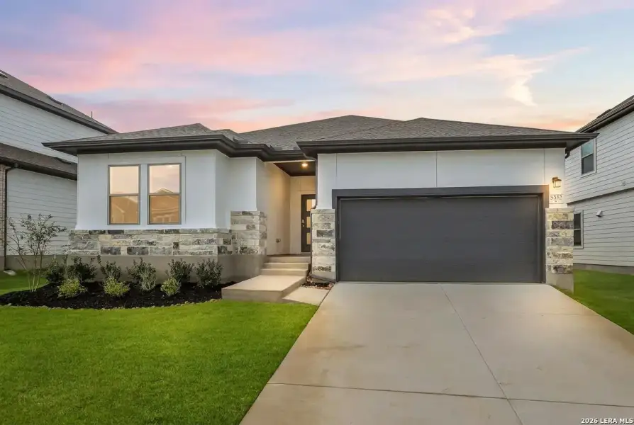Front exterior of a new home in Garden Grove, San Antonio, TX, highlighting curb appeal (Image 21).