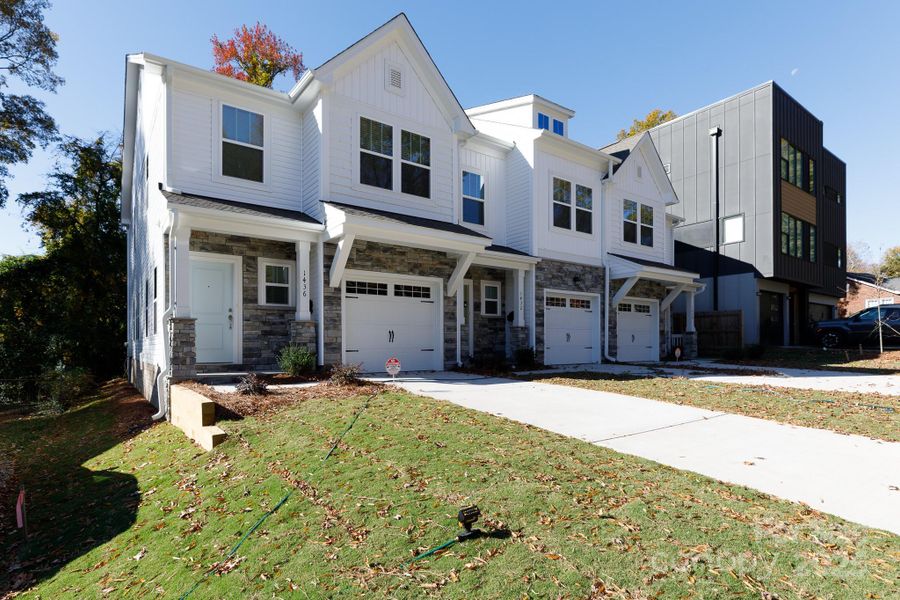 Front exterior of a new home in , Charlotte, NC, highlighting curb appeal (Image 1).