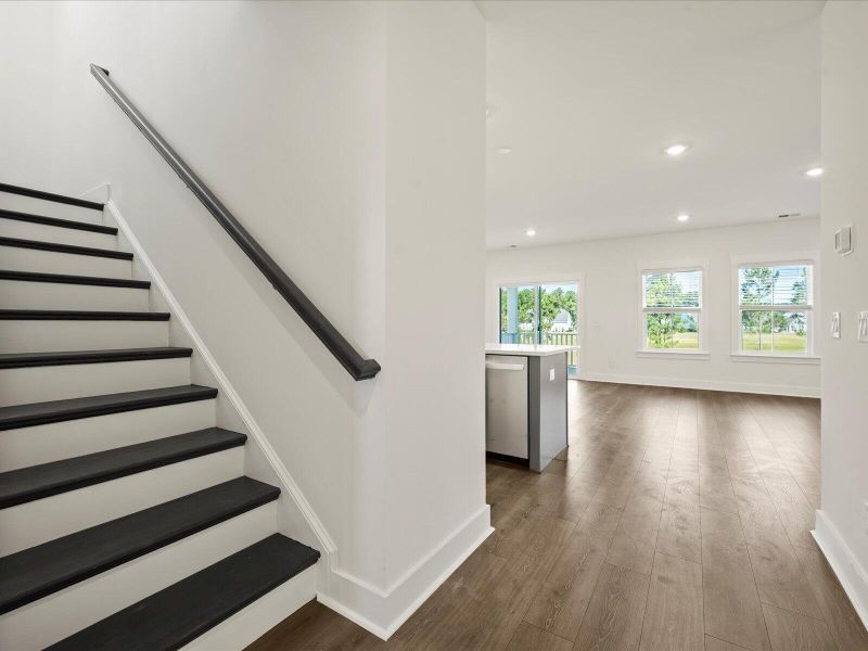Spacious, unfurnished interior of a new home in The Coves at Lakes of Cane Bay, Summerville (Image 37).