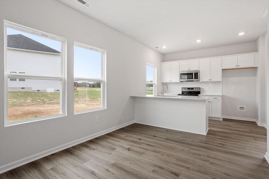 Spacious, unfurnished interior of a new home in Cambridge Reserve, Angier (Image 22).