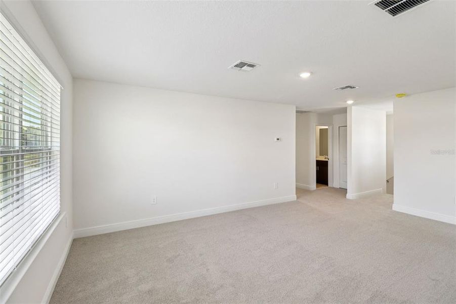 Spacious, unfurnished interior of a new home in The Reserve at Hammock Oaks - Classic Series, Lady Lake (Image 31).
