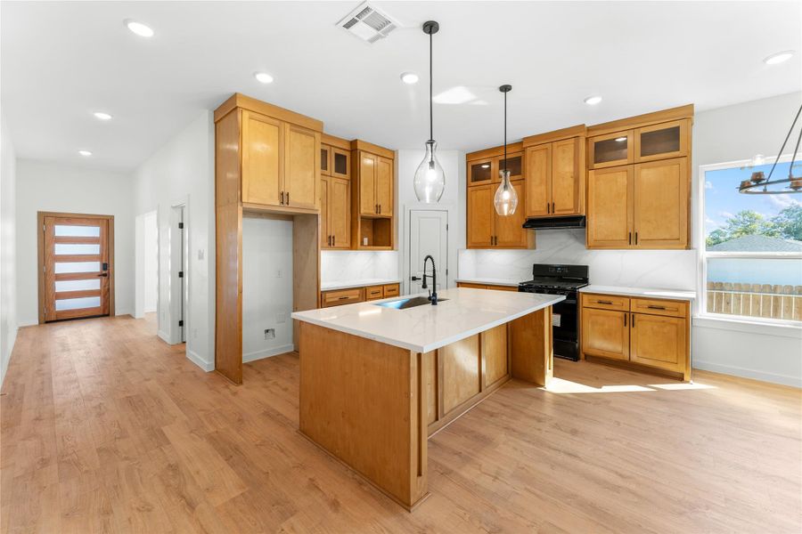 Another shot of this incredible kitchen with an oversized Quartz island