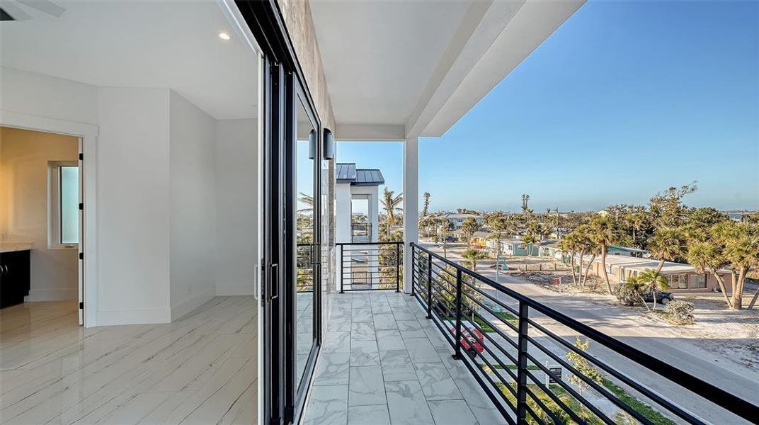 Exterior details and patio area of a home in , Englewood (Image 25).