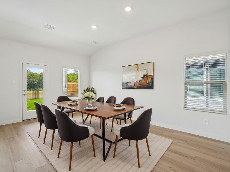 Furnished interior view inside a new home in Parks at Foster Crossing - Signature Series, Anna (Image 3).
