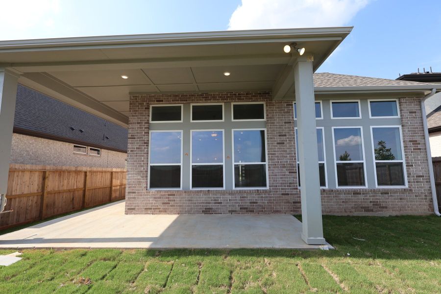 Exterior details and patio area of a home in Harvest Green - Reserve Collection, Richmond (Image 3).