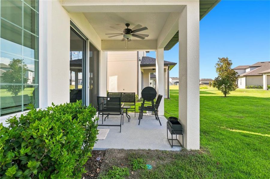 Exterior details and patio area of a home in Reunion Village, Kissimmee (Image 4).