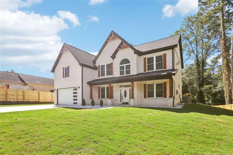 Front exterior of a new home in , Lilburn, GA, highlighting curb appeal (Image 29). Front exterior of a new home in , Lilburn, GA, highlighting curb appeal (Image 29).