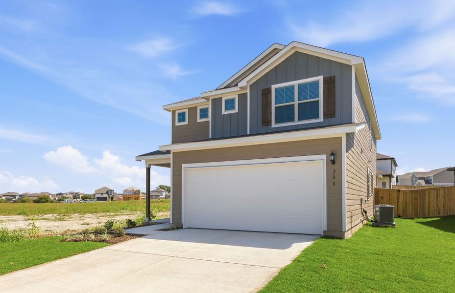 Front exterior of a new home in Sonterra, Jarrell, TX, highlighting curb appeal (Image 15).