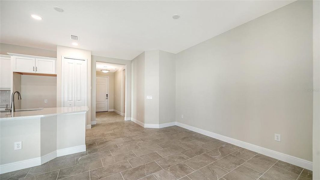Spacious, unfurnished interior of a new home in Vicenza Real Estate and Homes for Sale in North Venice, FL - Neal Communities, Nokomis (Image 13).