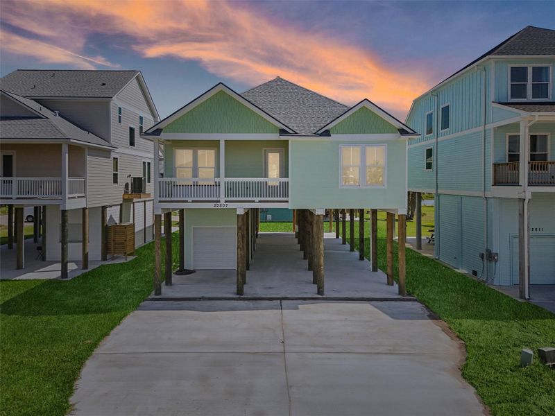 Front exterior of a new home in , Galveston, TX, highlighting curb appeal (Image 18).