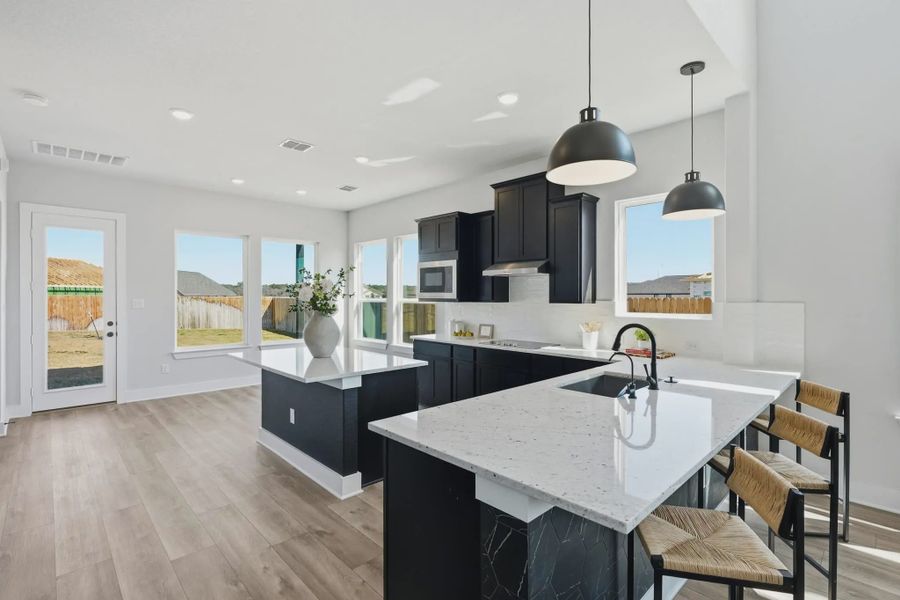 Representative furnished interior of a home built from the Lincoln by Chesmar Homes in Alsatian Oaks, Castroville (Image 6).