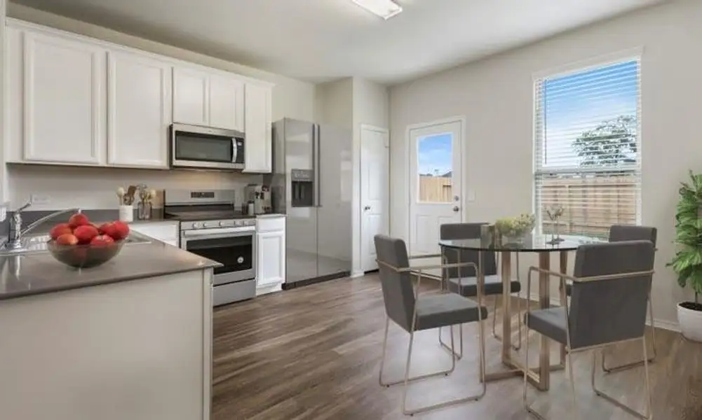 Furnished interior view inside a new home in The Pines At Seven Coves, Conroe (Image 4).