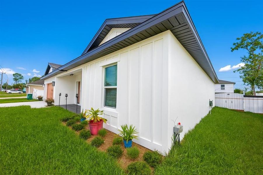 Front exterior of a new home in , Deltona, FL, highlighting curb appeal (Image 19).