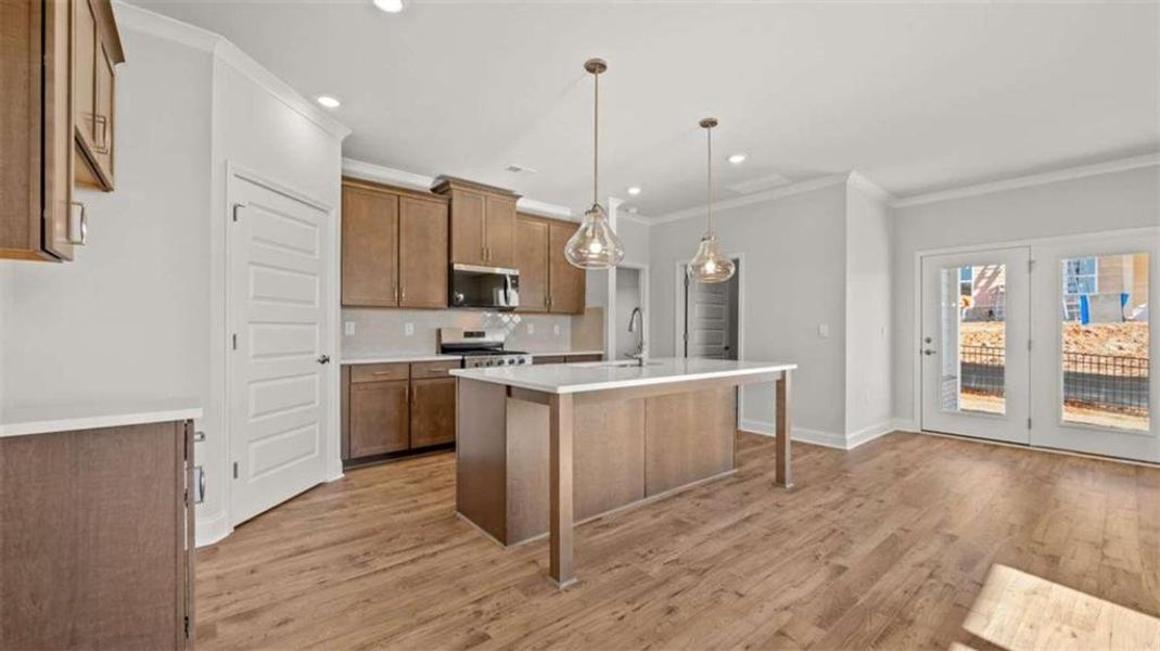 Furnished interior view inside a new home in Oak Ridge Meadows - Active Adult, Locust Grove (Image 4).