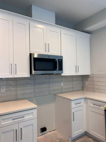 Furnished interior view inside a new home in The Towns At Long Bayou, Seminole (Image 4).