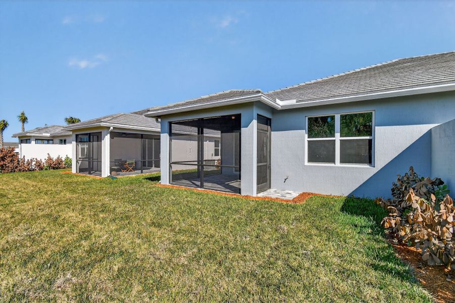 Exterior details and patio area of a home in Costa Pointe, Vero Beach (Image 33).