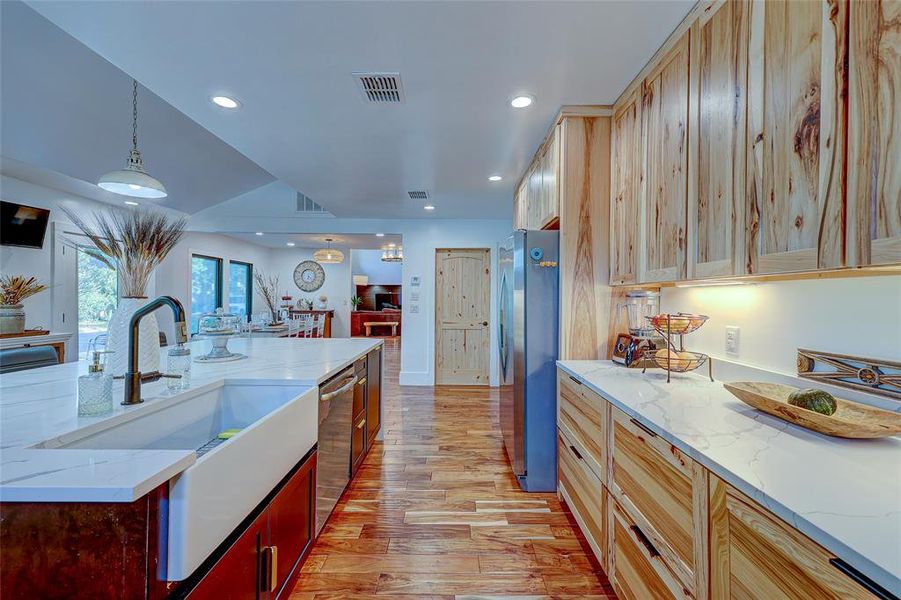 Cabinetry on both sides of the island means plenty of room for all your holiday and entertaining serviceware.94 San Saba St., AustinTX 78702 MLS# 7207900
