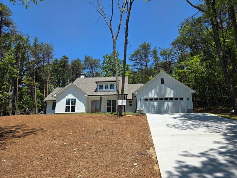 Front exterior of a new home in , Jasper, GA, highlighting curb appeal (Image 13). Front exterior of a new home in , Jasper, GA, highlighting curb appeal (Image 13).