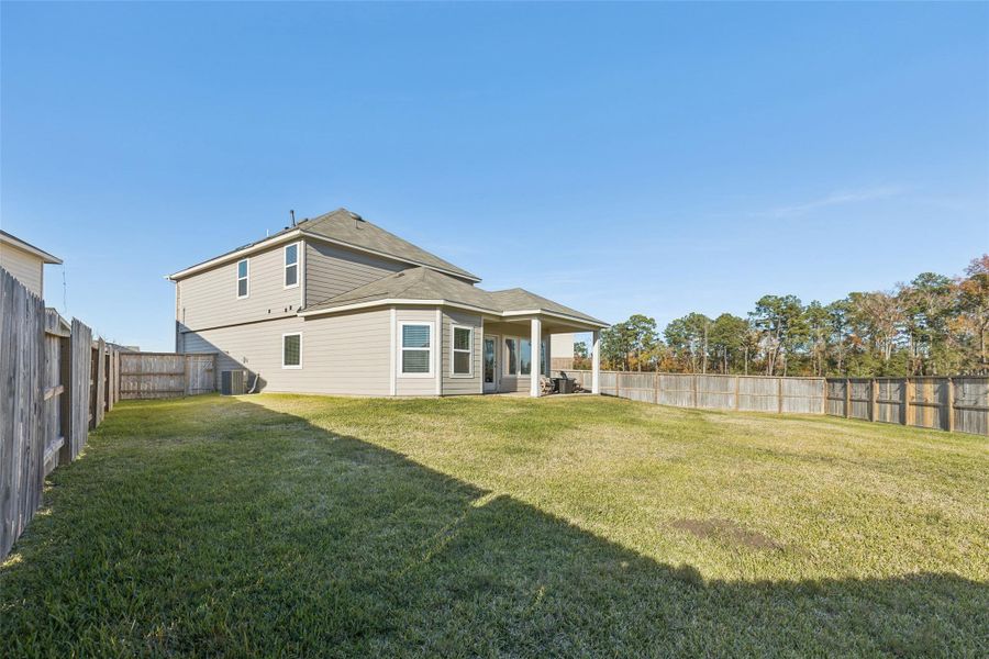 Exterior details and patio area of a home in , Willis (Image 30).