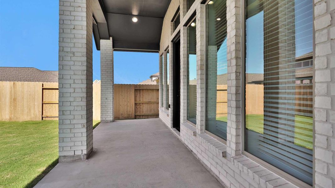 Exterior details and patio area of a home in Stonecreek Estates 50', Richmond (Image 4).