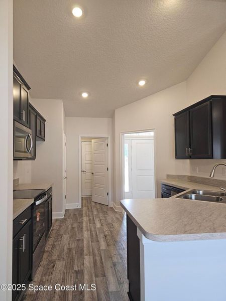 Furnished interior view inside a new home in Palm Bay, Palm Bay (Image 5). Furnished interior view inside a new home in Palm Bay, Palm Bay (Image 5).