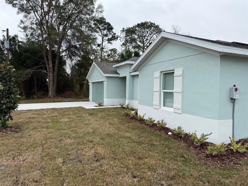 Exterior details and patio area of a home in , Palm Coast (Image 3). Exterior details and patio area of a home in , Palm Coast (Image 3).