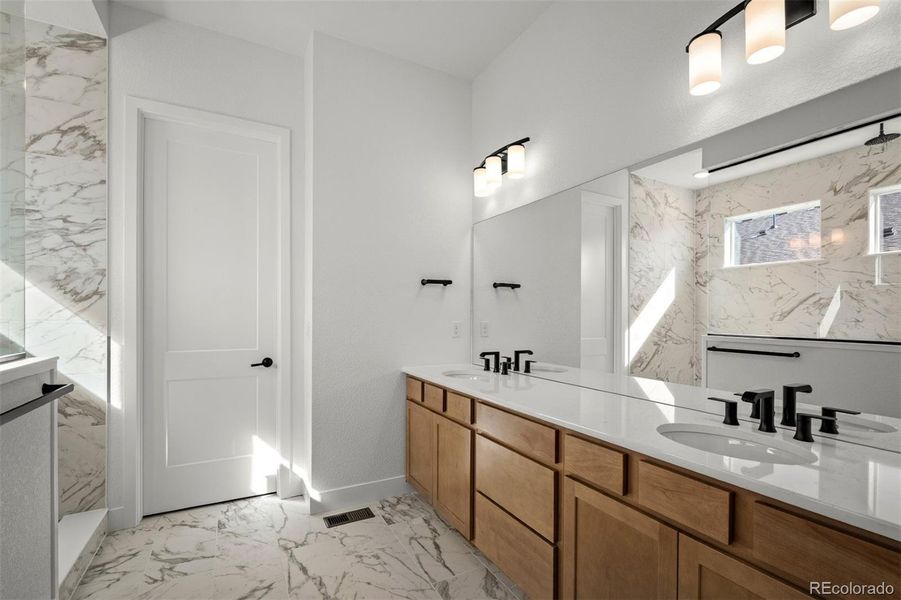 Furnished interior view inside a new home in Wolf Ranch - Enclave Collection, Colorado Springs (Image 10).