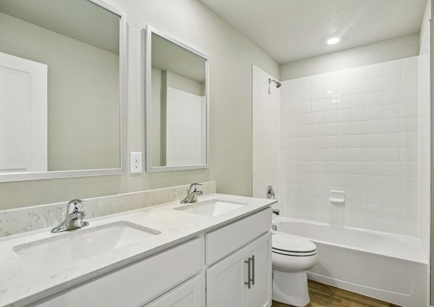 The secondary bathrooms have a tub/shower combo.