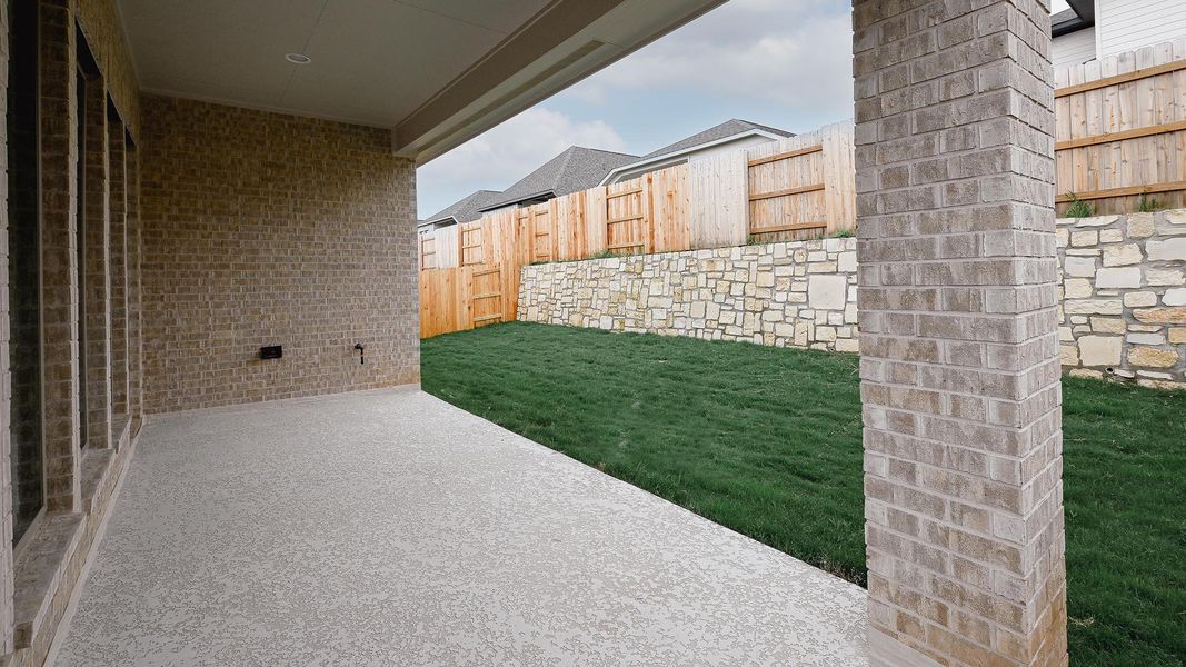 Exterior details and patio area of a home in Crosswinds, Kyle (Image 4).