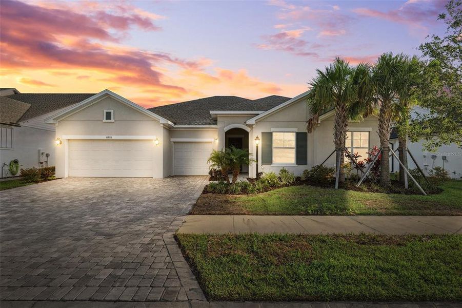 Front exterior of a new home in Copeland Creek, Odessa, FL, highlighting curb appeal (Image 24). Front exterior of a new home in Copeland Creek, Odessa, FL, highlighting curb appeal (Image 24).