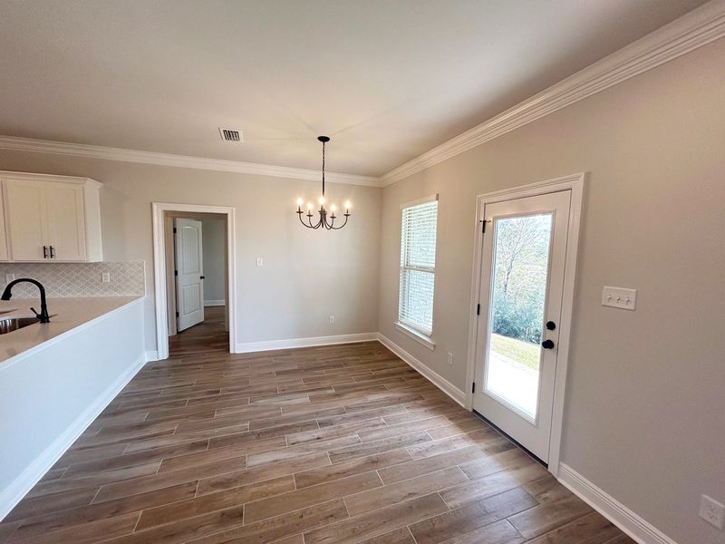 Spacious, unfurnished interior of a new home in The Bluffs at Lafayette, Freeport (Image 9).